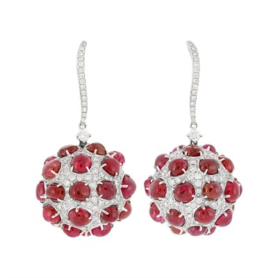 Lot 1111 - Pair of White Gold, Cabochon Ruby and Diamond Pendant-Earrings