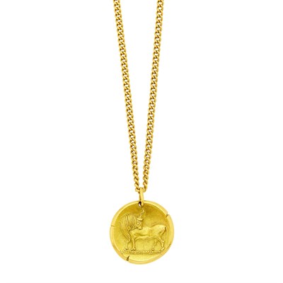 Lot 1008 - Van Cleef & Arpels Gold Taurus Zodiac Pendant, France, with Long Gold Chain Necklace