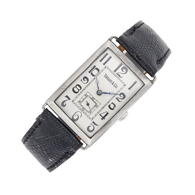 Lot 36 - Tiffany & Co. Silver Curved Rectangular Wristwatch