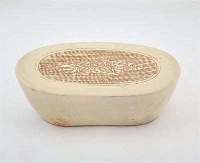 Lot 182 - A Chinese Cizhou Ware Bean-Shaped Pillow with Incised Lotus Motif
