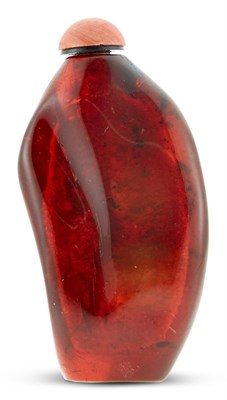 Lot 24 - A Chinese Amber Snuff Bottle