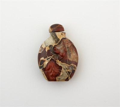 Lot 29 - A Chinese Carved Variegated Hardstone Snuff Bottle