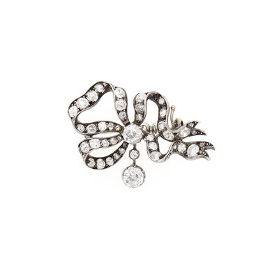 Lot 2087 - Antique Gold, Silver and Diamond Bow Pin