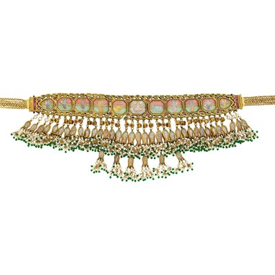 Lot 1056 - Indian Gold, Painted Hindu Diety, Enamel, Foil-Backed Ruby, Freshwater Pearl and Green Glass Bead Fringe Necklace