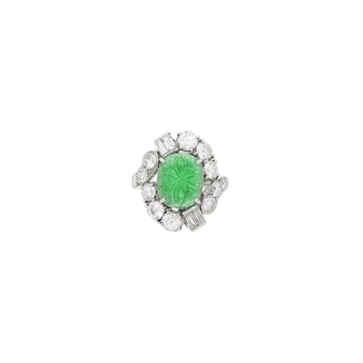 Lot 1088 - Platinum, Carved Emerald and Diamond Ring