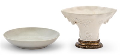 Lot 210 - A Chinese White Glazed Porcelain Dish and Dehua Porcelain Libation Cup