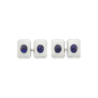Lot 1073 - Pair of Platinum and Cabochon Sapphire Cufflinks