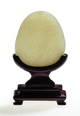 Lot 62 - A Chinese Carved White Jade Plaque