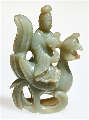 Lot 70 - A Chinese Celadon Jade Figural Carving