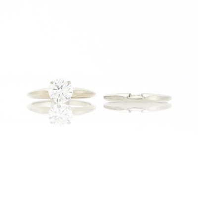 Lot 1171 - White Gold and Diamond Ring and Band Ring