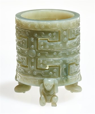 Lot 72 - A Chinese Carved Celadon Jade Interlocking Brush Pot