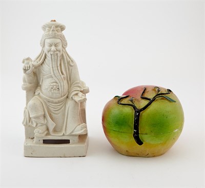 Lot 404 - A Chinese White Glazed Porcelain Figure of Guandi