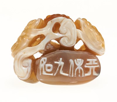 Lot 76 - A Chinese Carved Agate Toggle