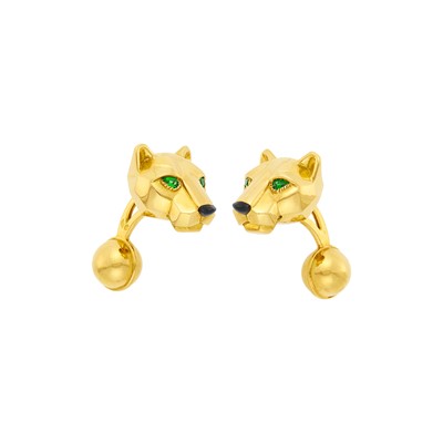 Lot 238 - Cartier Pair of Gold, Emerald and Black Onyx 'Panther' Cufflinks, France