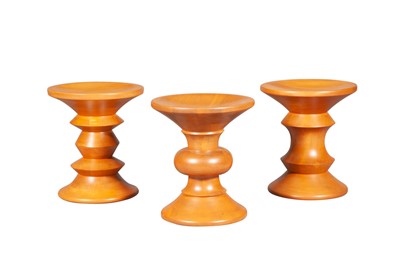 Lot 141 - Three Charles and Ray Eames Walnut Time-Life Stools