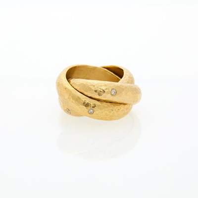 Lot 1066 - Boaz Kashi Three Row Hammered Gold, Diamond and Ruby 'Rolling' Band Ring