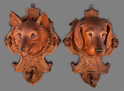 Lot 1145 - Pair of Black Forest Carved Wood Figural Wall...