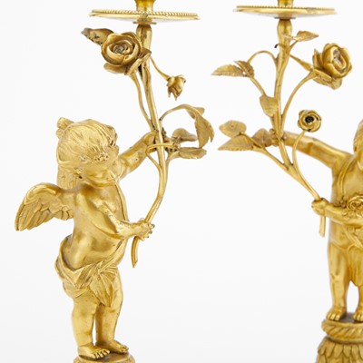 Lot 137 - Pair of Louis XVI Style Gilt-Bronze Figural Candlesticks