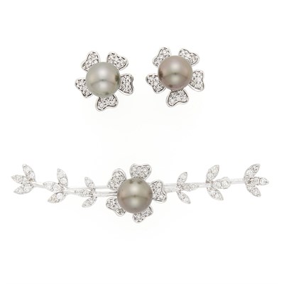 Lot 1124 - White Gold, Gray Tahitian Cultured Pearl and Diamond Flower Bar Brooch and Pair of Earrings
