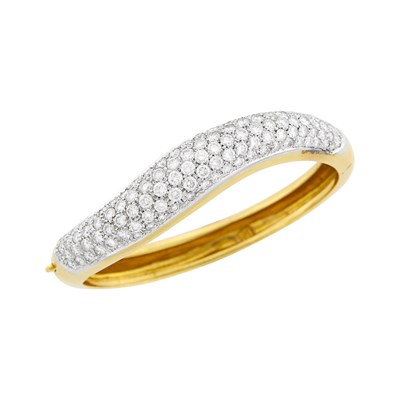 Lot 123 - Two-Color Gold and Diamond Bombé Bangle Bracelet