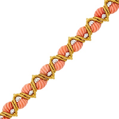 Lot 111 - André Vassort Gold, Carved Angel Skin Coral and Diamond Bracelet, France