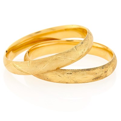 Lot 1199 - Two Gold Bangle Bracelets
