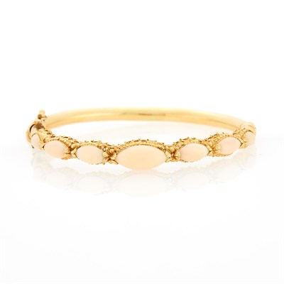 Lot 1282 - Gold and Angel Skin Coral Bangle Bracelet