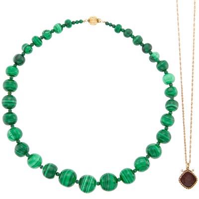 Lot 1277 - Gold and Black Onyx Intaglio Pendant-Necklace and Malachite Bead Necklace