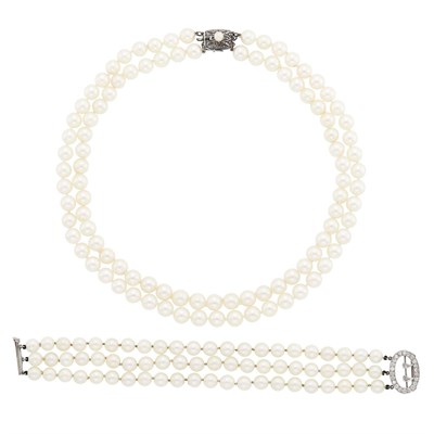 Lot 1104 - Triple Strand Cultured Pearl Bracelet with White Gold and Diamond Clasp and Mikimoto Necklace with Silver Clasp