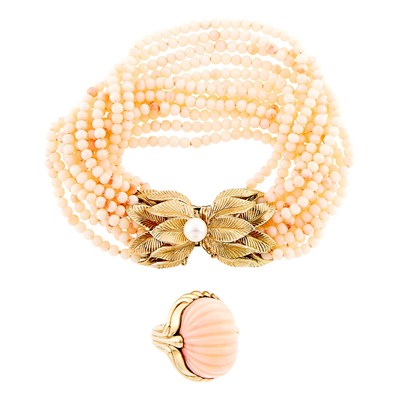 Lot 1279 - Tiffany & Co. Multistrand Coral Bead Bracelet with Gold and Cultured Pearl Clasp and Carved White Coral Ring