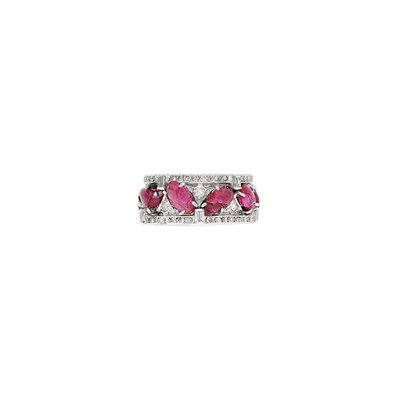 Lot 106 - Platinum, Carved Ruby and Diamond Band Ring