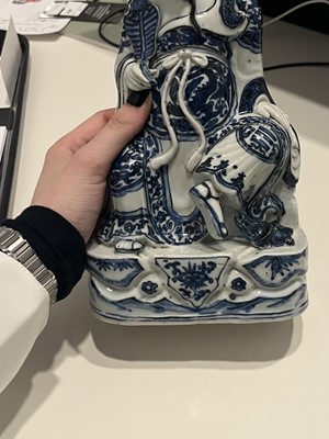 Lot 363 - A Chinese Blue and White Porcelain Figure of a Seated Immortal