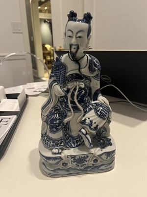 Lot 363 - A Chinese Blue and White Porcelain Figure of a Seated Immortal