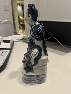 Lot 363 - A Chinese Blue and White Porcelain Figure of a Seated Immortal