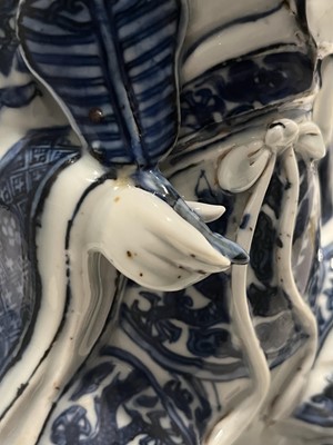 Lot 363 - A Chinese Blue and White Porcelain Figure of a Seated Immortal