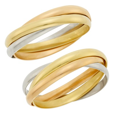 Lot 33 - Pair of Tricolor Gold Interlocking Bangle Bracelets