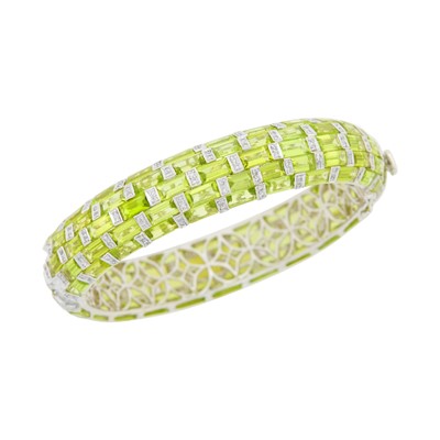 Lot 119 - White Gold, Peridot and Diamond Bangle Bracelet