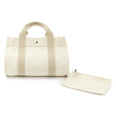 Lot 154 - Hermès Ivory Cannes Tote