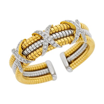Lot 26 - Three Row Two-Color Gold and Diamond Bangle Bracelet