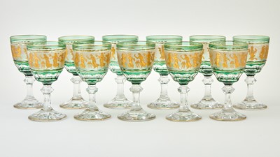 Lot 314 - Set of Eleven Bohemian Style Etched, Gilt and Green Overlay Glass Goblets