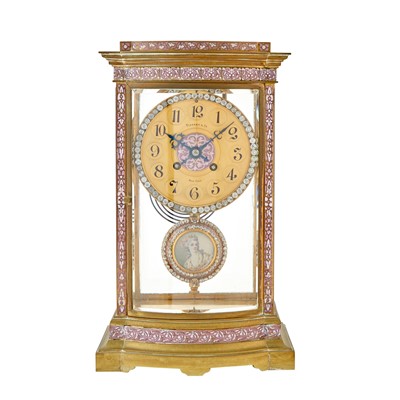 Lot 174 - Tiffany & Co. Pink Enameled and Jeweled Brass Mantel Clock