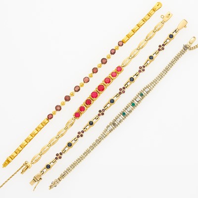Lot 1165 - Four Gold, Simulated and Gem-Set Bracelets