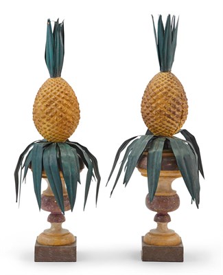 Lot 317 - Pair of Painted Tole Pineapple Ornaments...