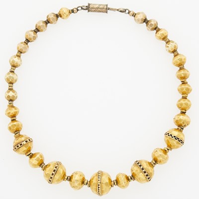 Lot 1145 - Gold and Silver-Gilt Bead Necklace