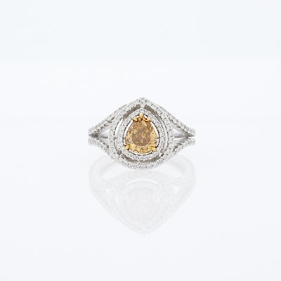 Lot 1260 - White Gold, Colored Diamond and Diamond Ring