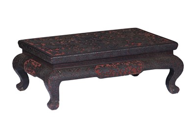 Lot 157 - A Chinese Cinnabar and Black Lacquer Low Table