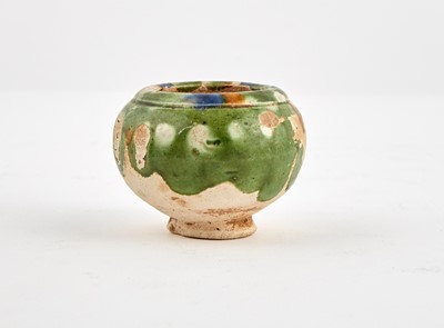 Lot 306 - A Chinese Sancai Glazed Earthenware Jar