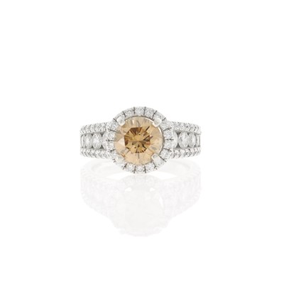 Lot 2087 - White Gold, Colored Diamond and Diamond Ring