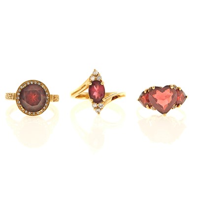 Lot 1198 - Three Gold, Garnet and Diamond Rings