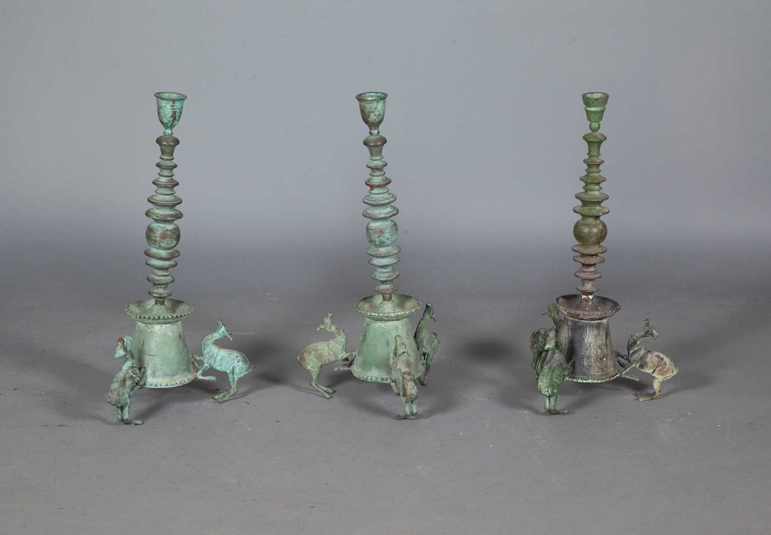 Lot 114 - Three Bronze Candlesticks